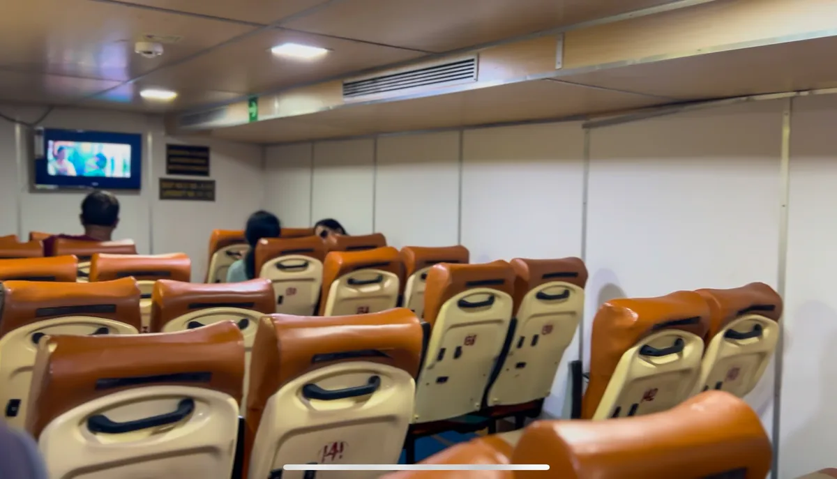 Green Ocean interior — basic but clean seating with TV screens on each deck Green Ocean interior seating with ocean views