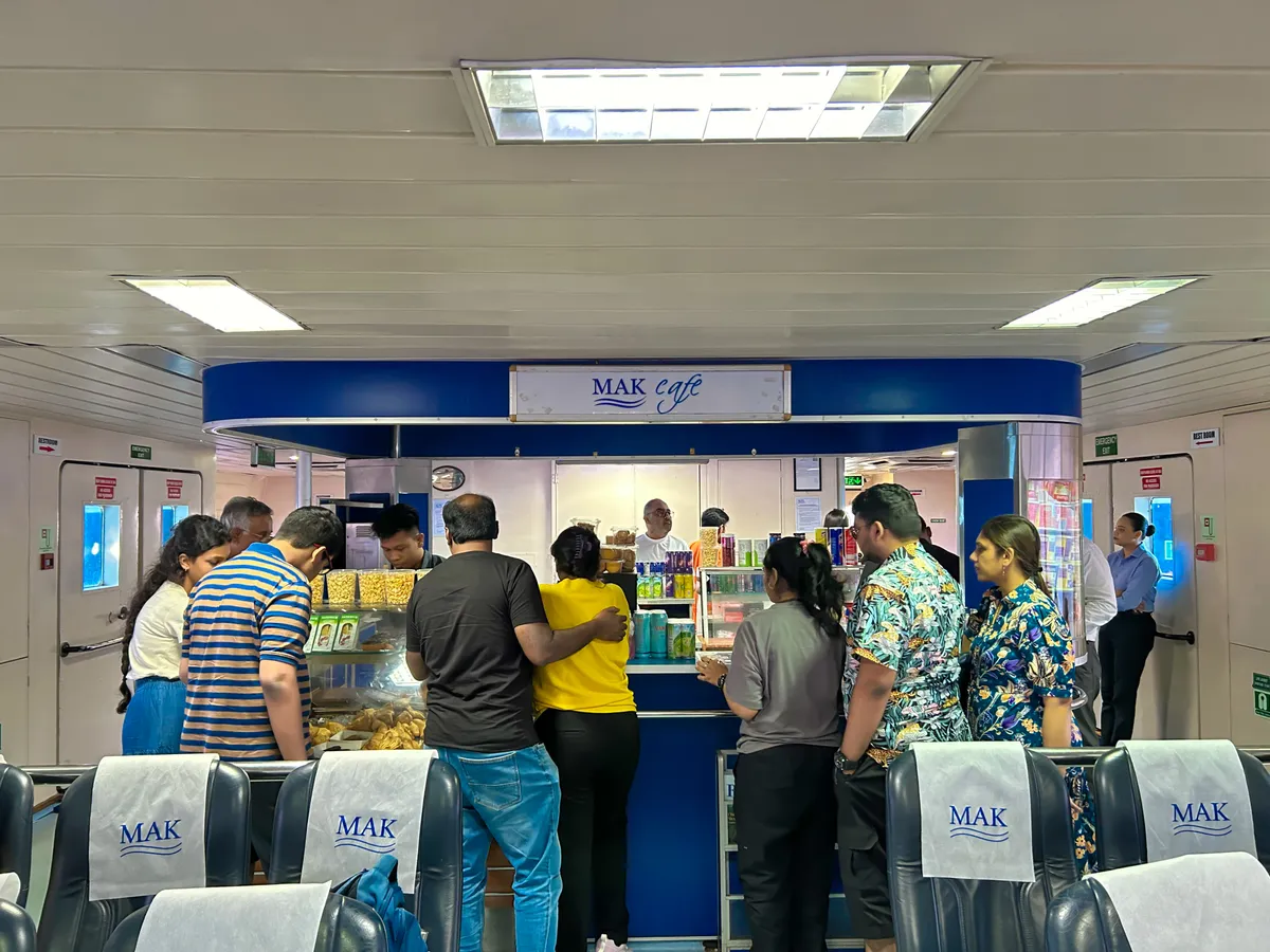 Onboard cafeteria – available for all classes (Rs 50-100 for basics) Makruzz onboard cafeteria with snacks and beverage counter