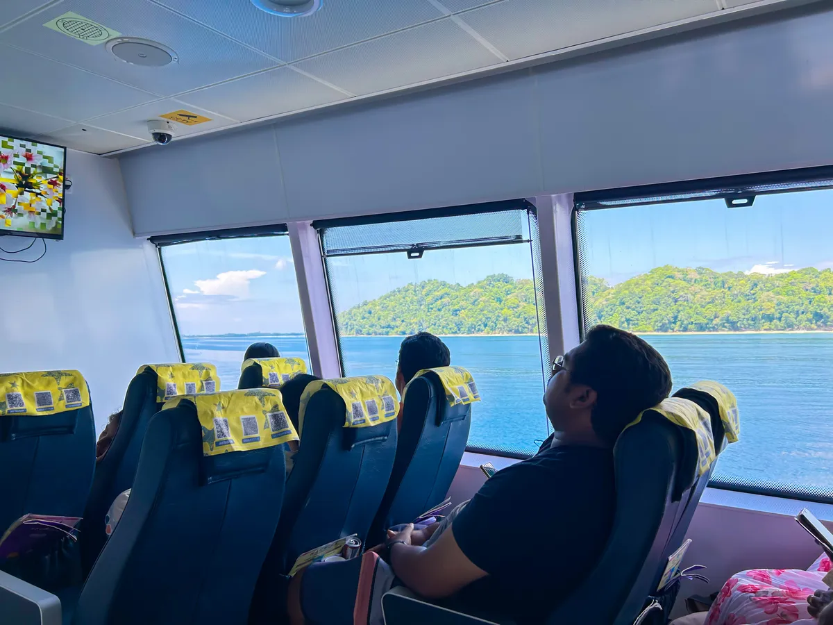 Nautika Luxury class — reclining seats with decent legroom across two decks Nautika Luxury class interior seating with reclining seats